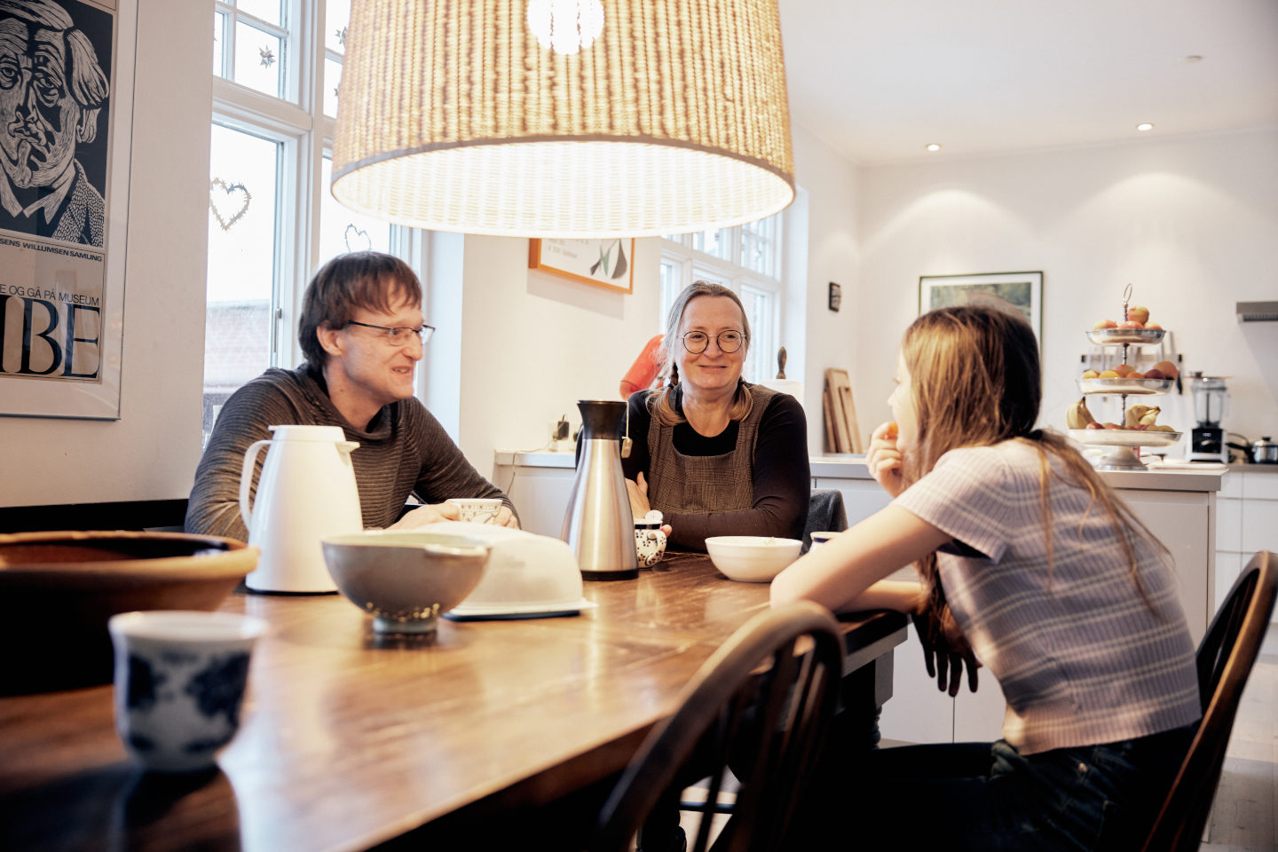 Marian at the kitchen table with her family