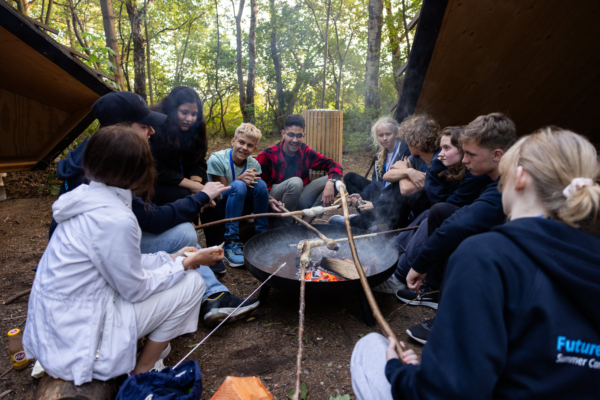 Image of people around a camp fire