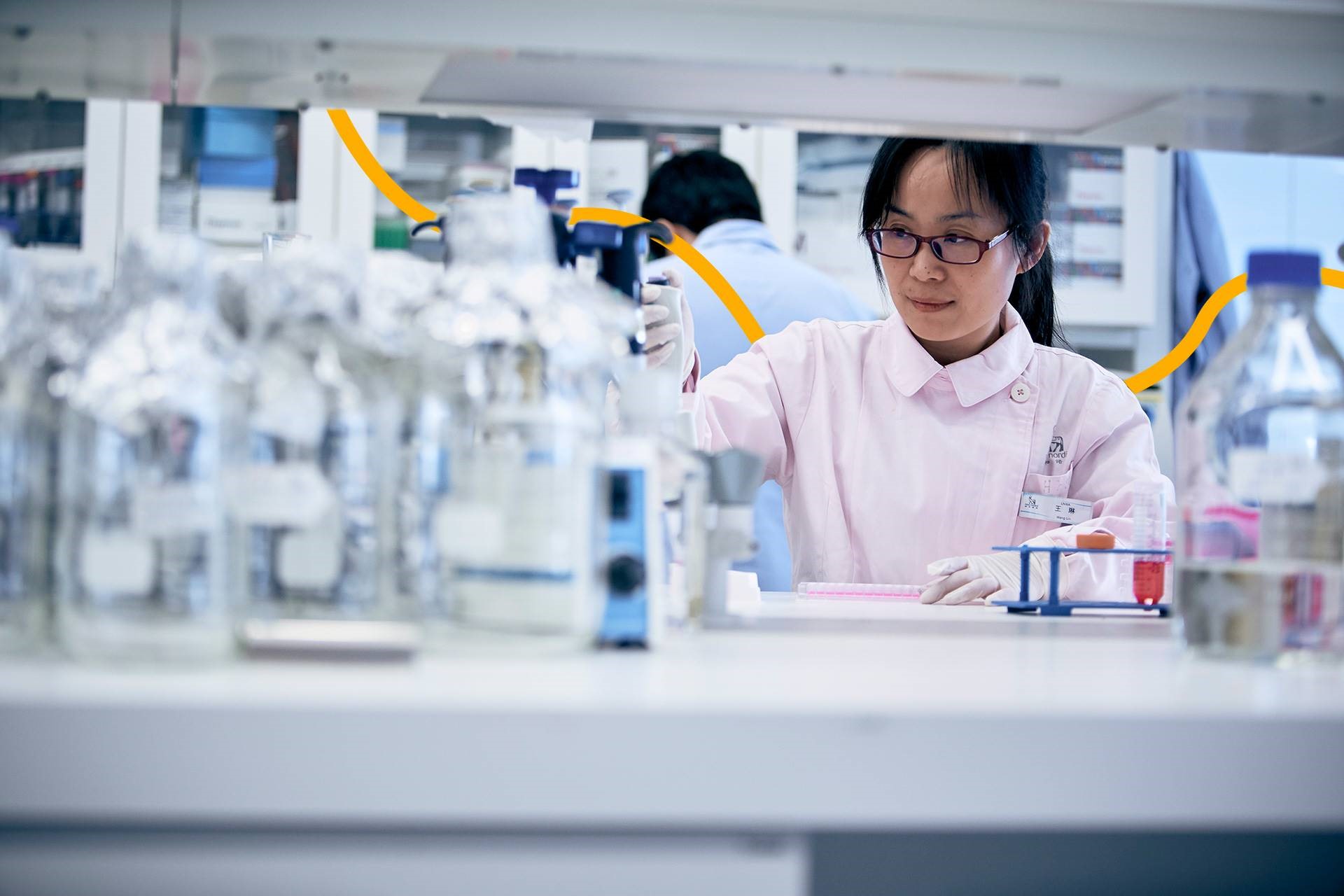 Colleague working inside a lab